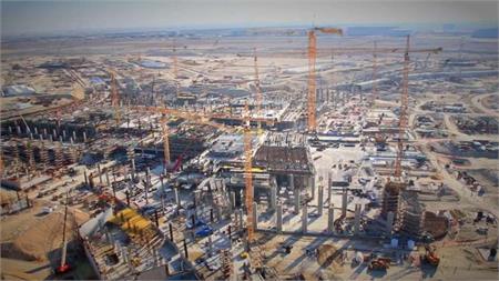 Watch an aerial view of the Midfield Terminal Project development in December 2013